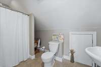 Bathroom off of bonus room and upstairs bedroom