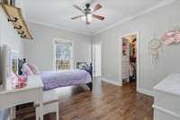 Bedroom with walk-in closet and bathroom