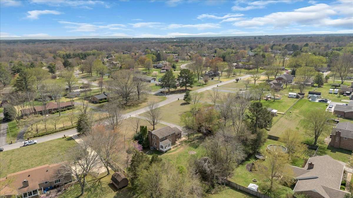 Welcome to 203 Twelve Oaks Rd in Tara Estates! This 4 bedroom, 2 bath home with a flexible bonus room sits on 0.89 acres and is just minutes from downtown Tullahoma, Normandy Lake, and Tims Ford Lake and Lakewood Country Club
