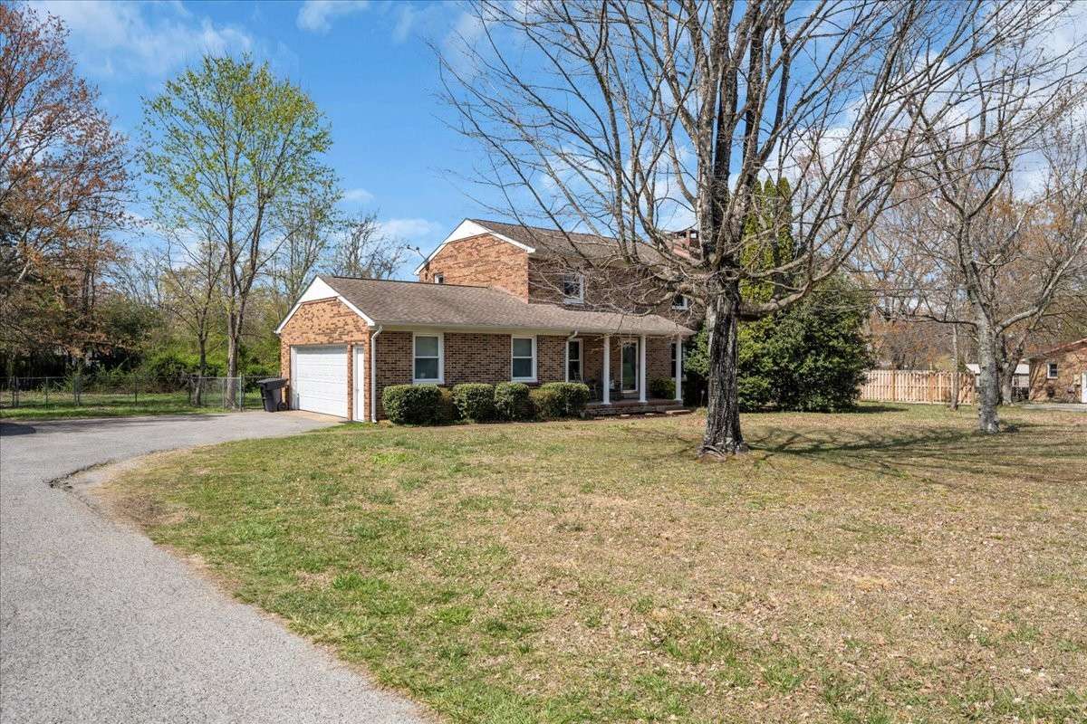 Oversized attached 2-car garage with abundant storage, plus extended driveway offering ample additional parking.