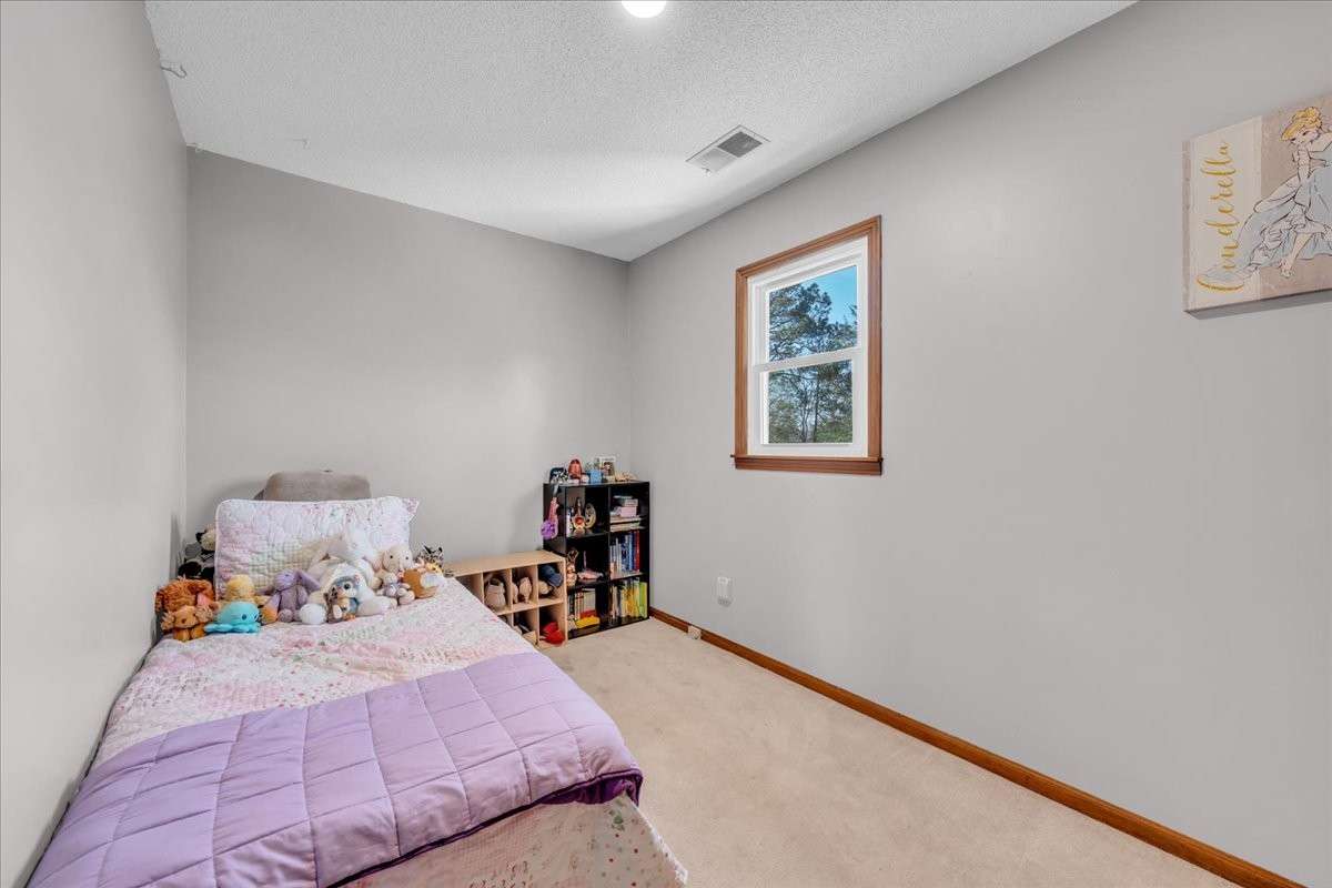 Additional bedroom perfect for guests, family, or office use.