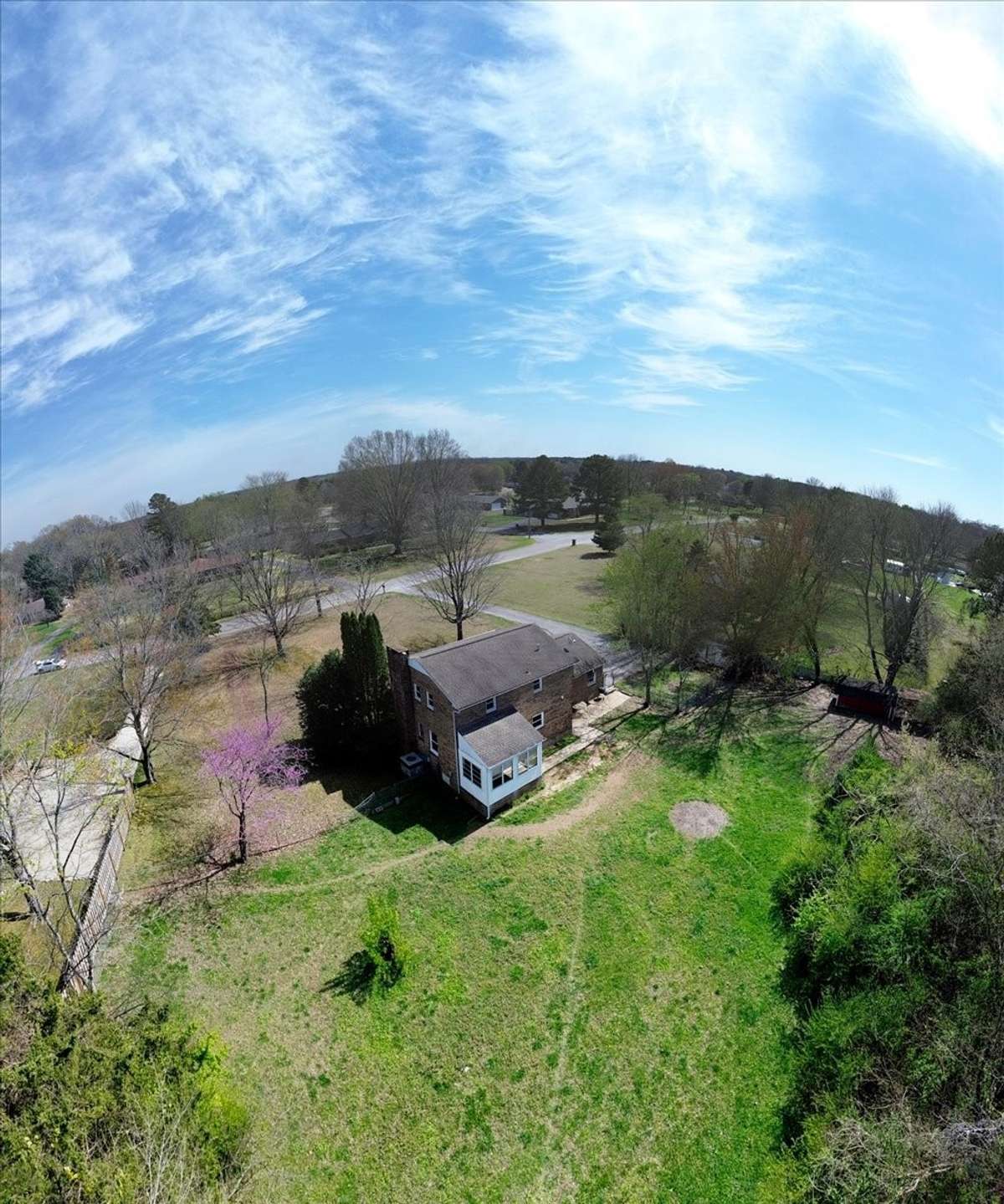 Welcome to 203 Twelve Oaks Rd in Tara Estates! This 4 bedroom, 2 bath home with a flexible bonus room sits on 0.89 acres and is just minutes from downtown Tullahoma, Normandy Lake, and Tims Ford Lake and Lakewood Country Club