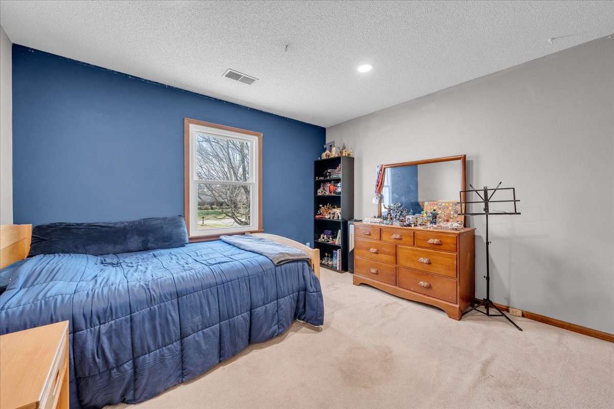 Well-sized secondary bedroom with comfortable layout and natural light.