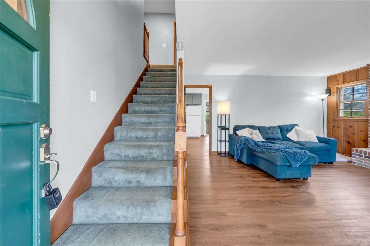 This 4 bedroom, 2 bath home with a flexible bonus room sits on 0.89 acres, includes an updated Kitchen and flooring and original charm.