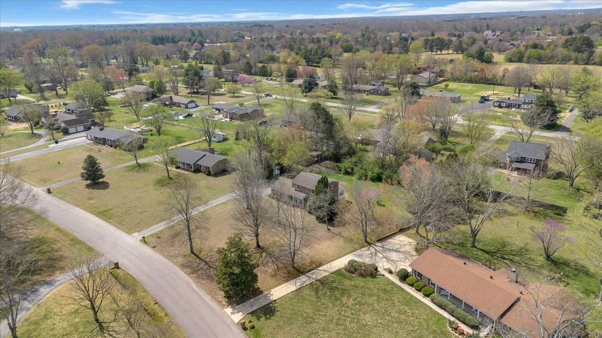 Welcome to 203 Twelve Oaks Rd in Tara Estates! This 4 bedroom, 2 bath home with a flexible bonus room sits on 0.89 acres and is just minutes from downtown Tullahoma, Normandy Lake, and Tims Ford Lake and Lakewood Country Club
