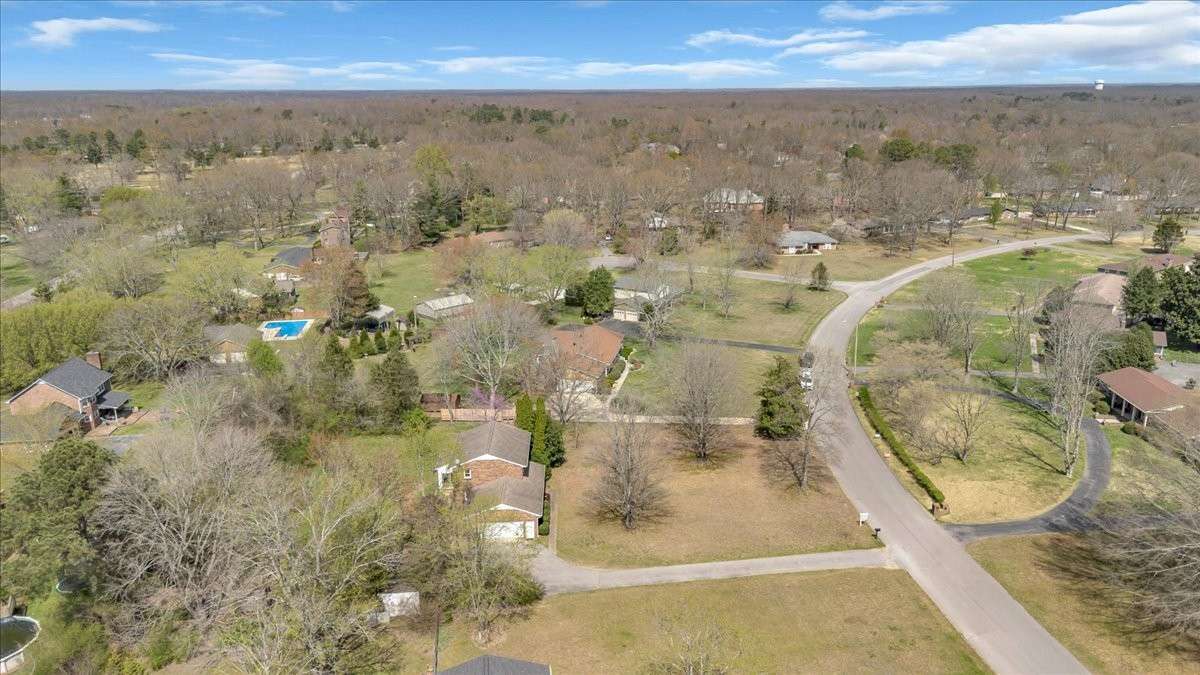 Welcome to 203 Twelve Oaks Rd in Tara Estates! This 4 bedroom, 2 bath home with a flexible bonus room sits on 0.89 acres and is just minutes from downtown Tullahoma, Normandy Lake, and Tims Ford Lake—perfect for enjoying both convenience and outdoor