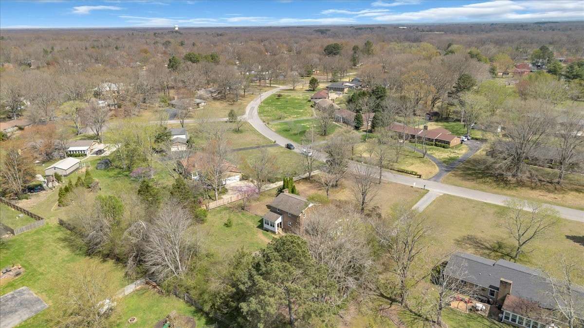 Generous backyard on 0.89 acres with ample space for gardening, play, or relaxation.