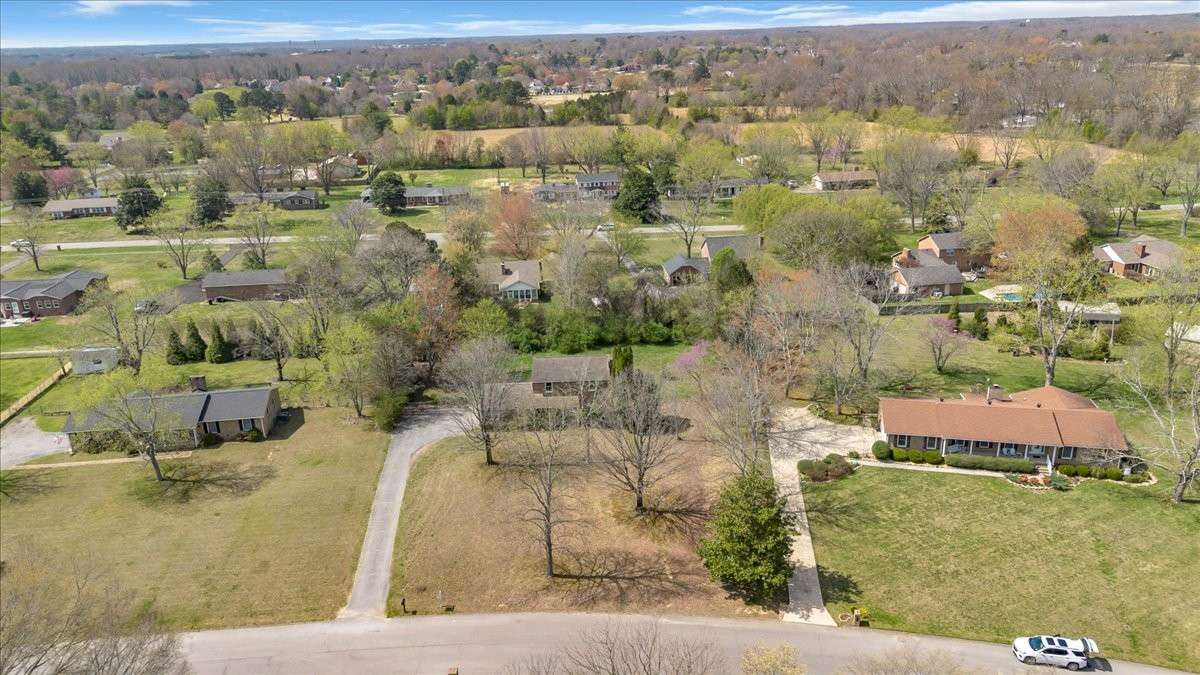 Welcome to 203 Twelve Oaks Rd in Tara Estates! This 4 bedroom, 2 bath home with a flexible bonus room sits on 0.89 acres and is just minutes from downtown Tullahoma, Normandy Lake, and Tims Ford Lake—perfect for enjoying both convenience and outdoor
