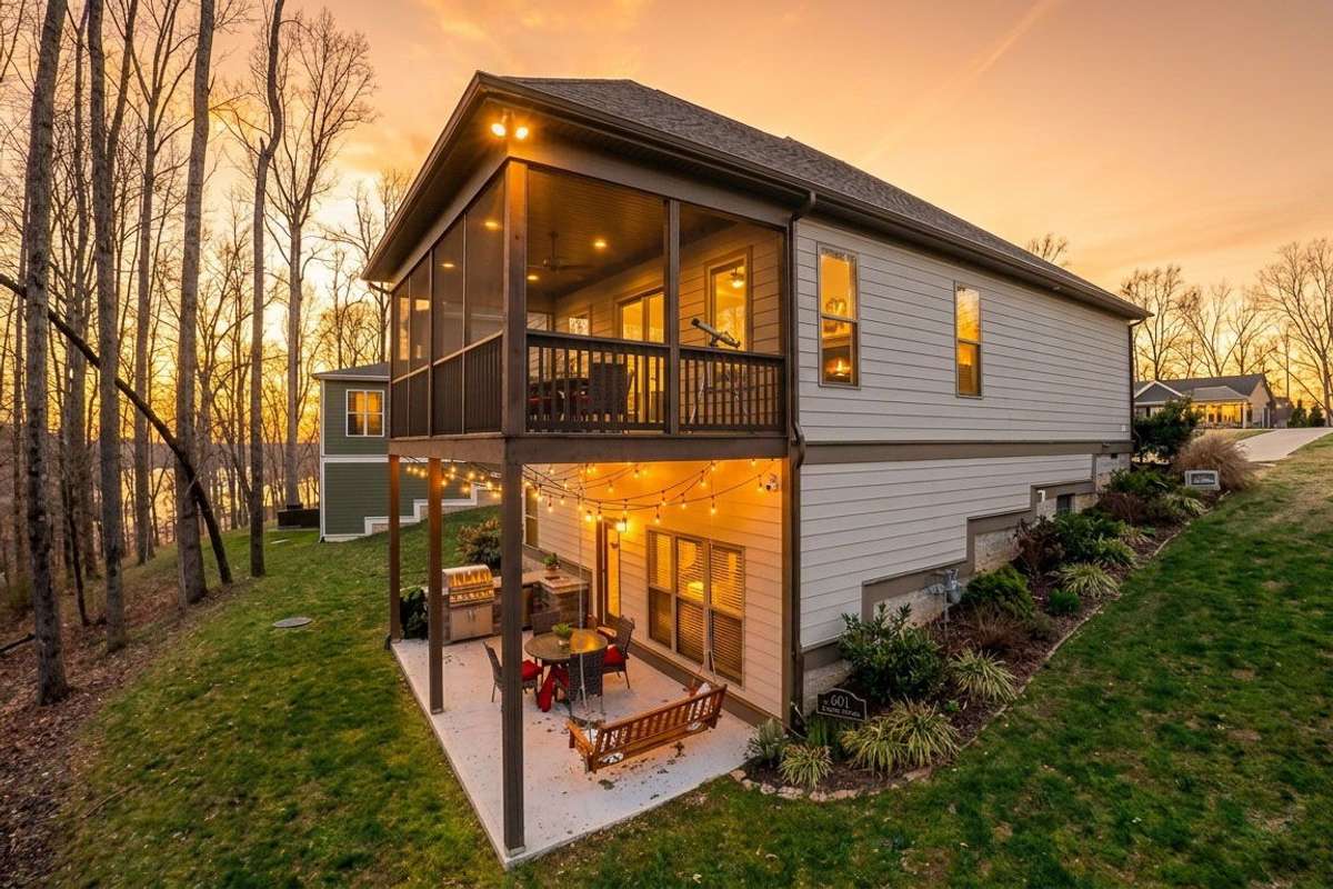 2  levels of outdoor living with a gas grill for maximizing lake life.