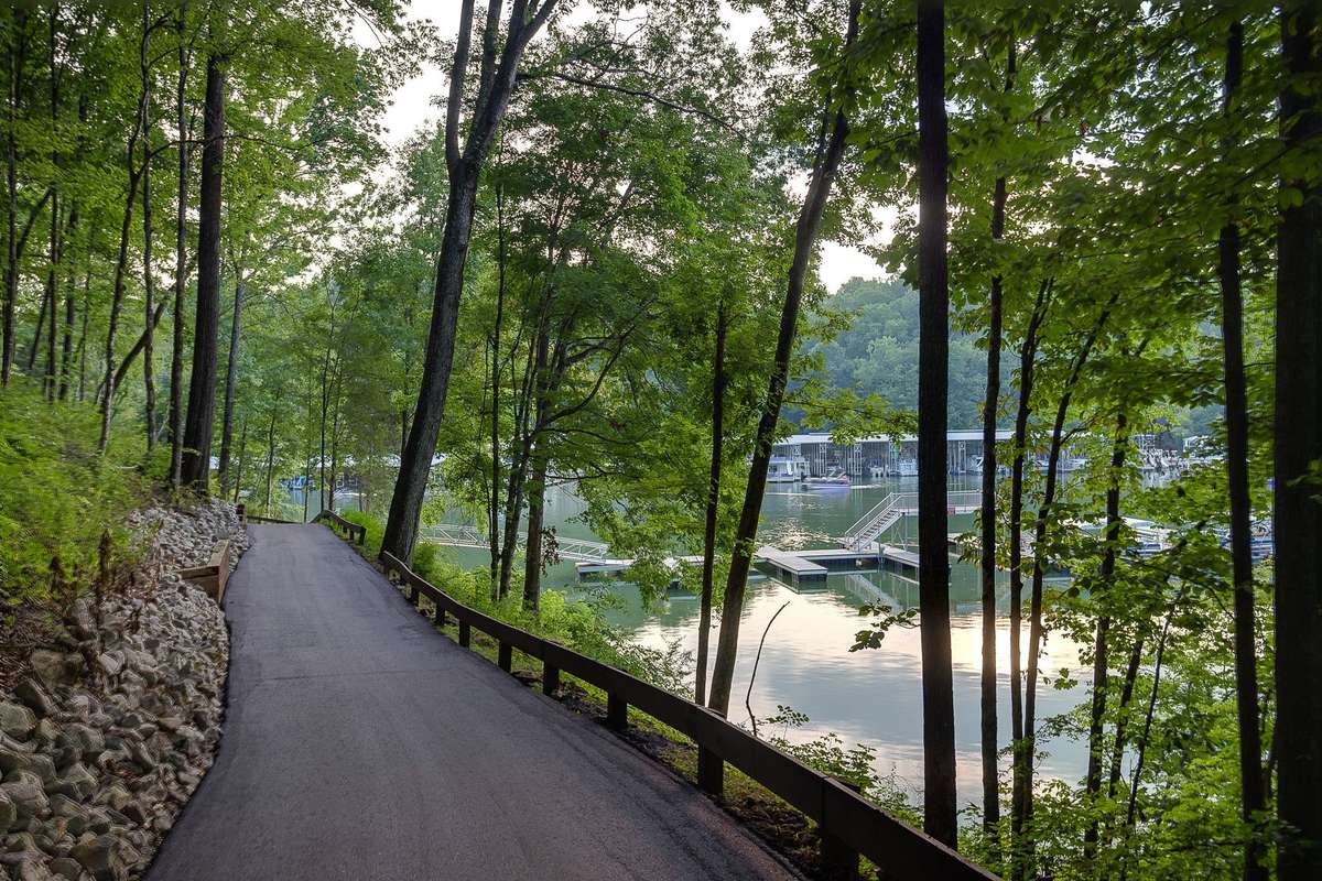 Beautiful and convenient neighborhood path that leads you right to the marina and popular Blue Gill Grill