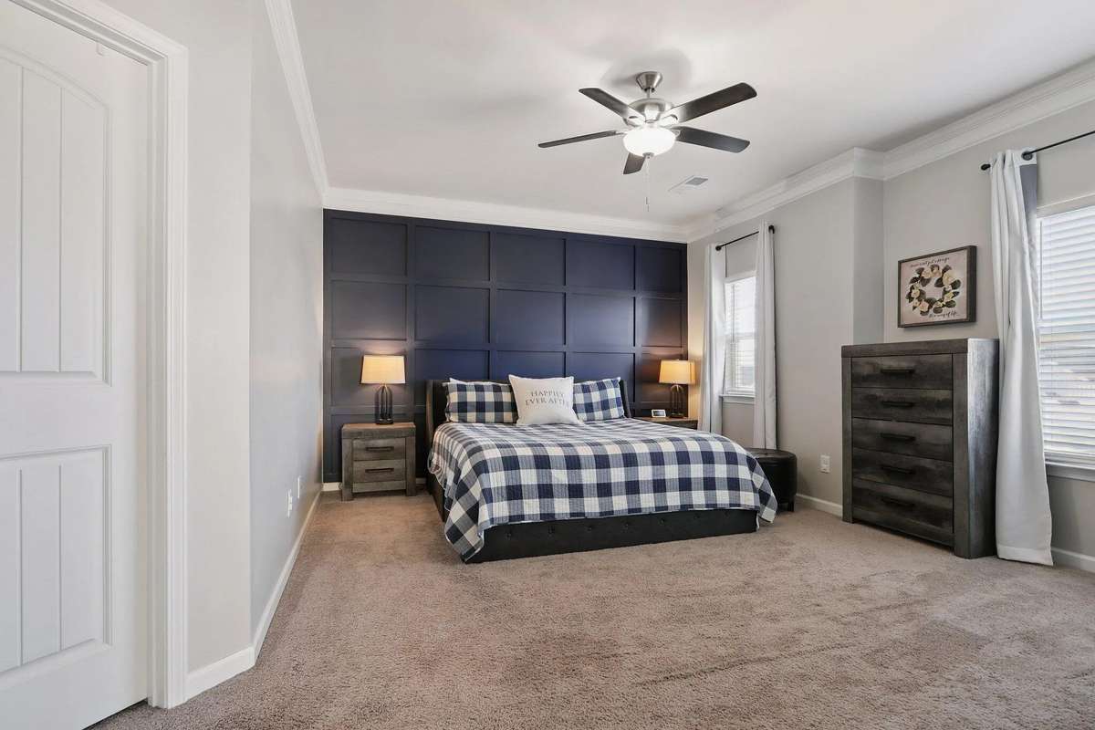 Large owners suite. Nice accent wall. All beds are up.