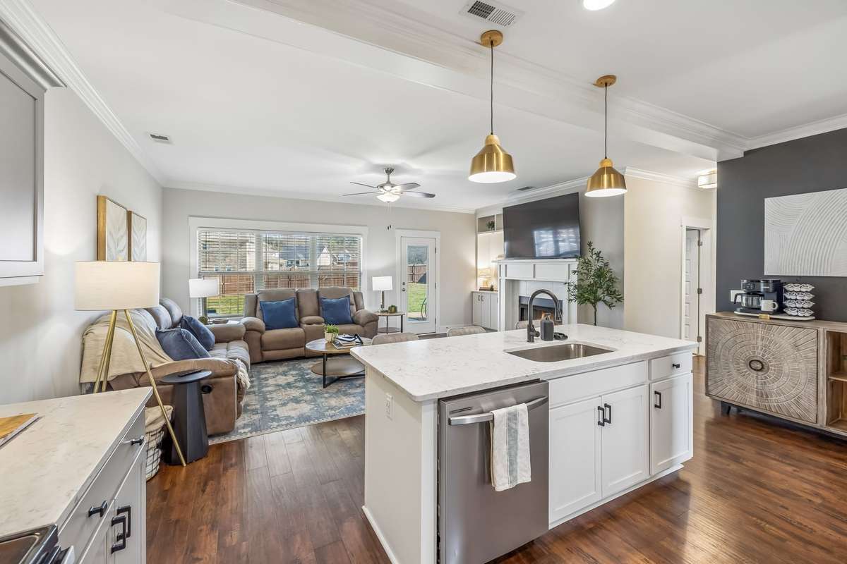 THERE IS EVEN ROOM FOR A COFFEE BAR AND THE KITCHEN IS OPEN TO THE LIVING ROOM-GREAT FOR SPENDING TIME TOGETHER, HOMEWORK WHILE COOKING, WATCHING A GAME OR ENTERTAINING.
