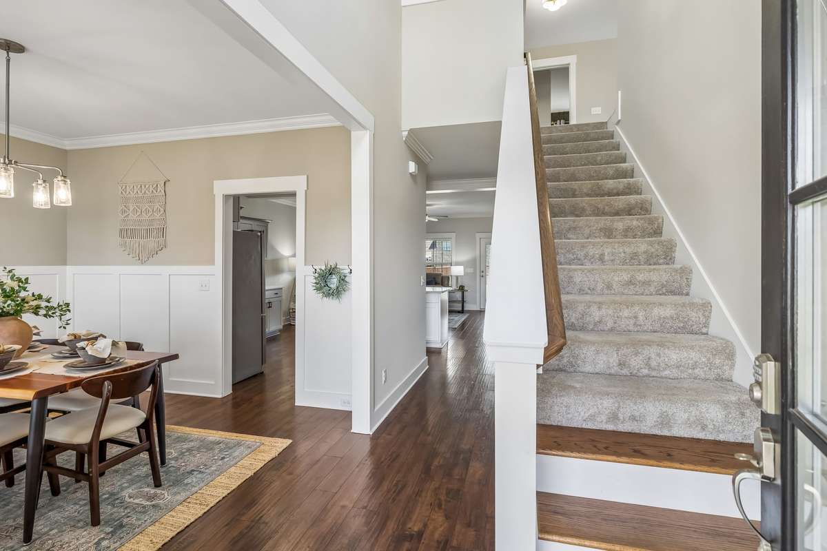 GORGEOUS ENTRY WITH HARDWOOD FLOORING AND NEW PAINT.