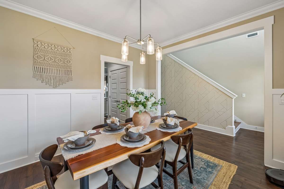 THE ENTRY/STAIR WALL IS A BEAUTIFUL ACCENT WALL WITH WALLPAPER!