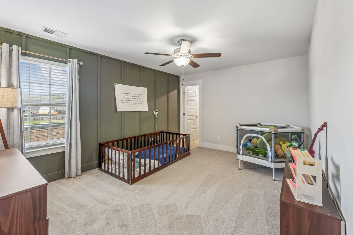 THE FOURTH BEDROOM IS SO CUTE WITH THE ACCENT WALL, IT'S BIG ENOUGH FOR KING SUITE OF FURNITURE AS WELL AND HAS A WALK-IN CLOSET.