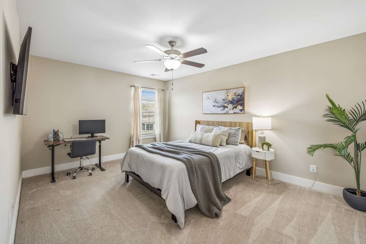 THIRD BEDROOM IS THE SIZE OF A PRIMARY SUITE WITH A WALK-IN CLOSET, TOO!