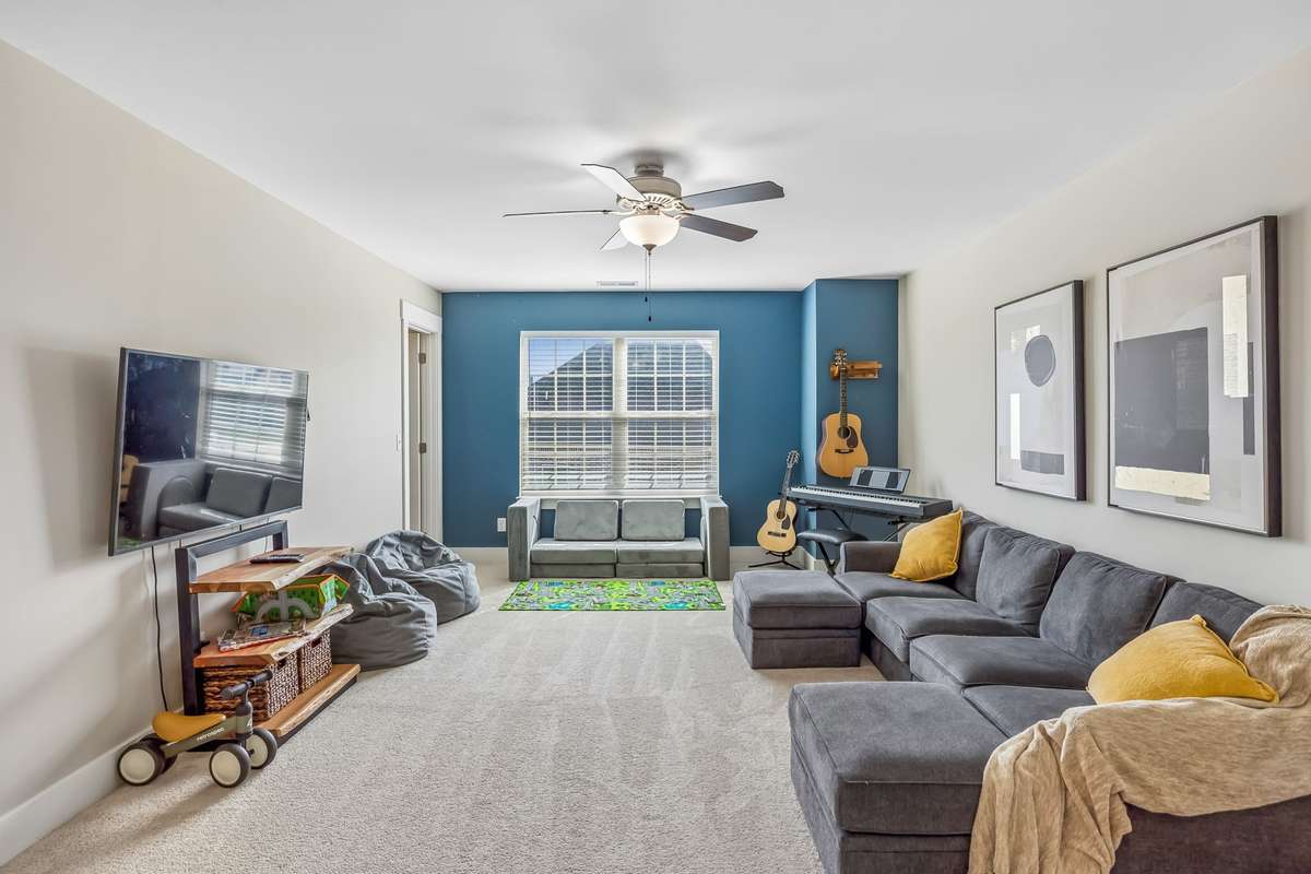 THE BONUS ROOM HAS A CUTE ACCENT COLOR WALL AND HUGE WALK-IN CLOSET!