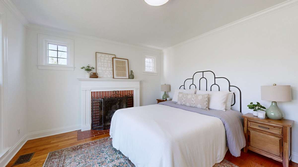 This large flex room features large windows and gas fireplace. Owners used it as primary/3rd bedroom.