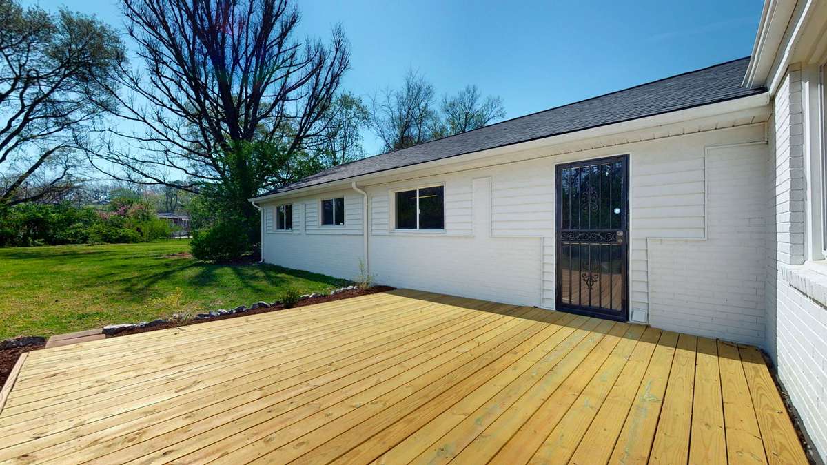 Grill & chill on the brand new deck overlooking large backyard.