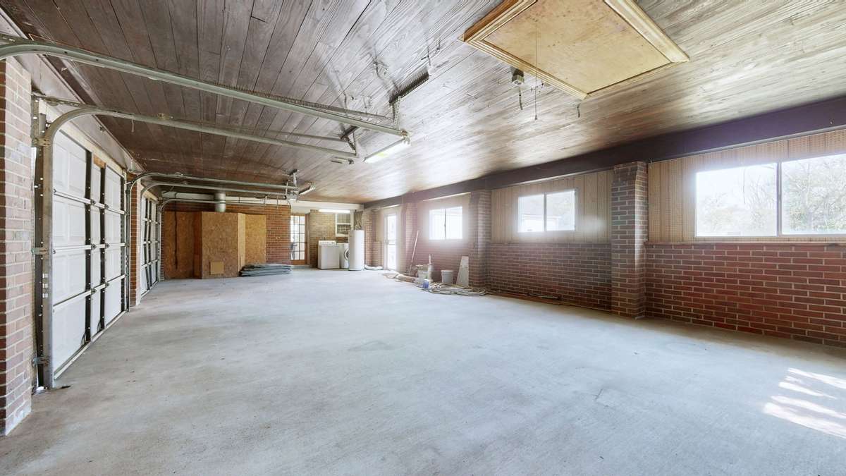 3 car garage! Convert one of the bays to a home office/studio/gym.