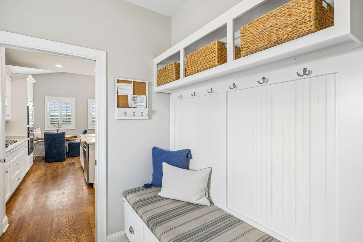 Laundry room & drop zone.  Located as you walk in from the garage.  Extra storage with under bench drawers