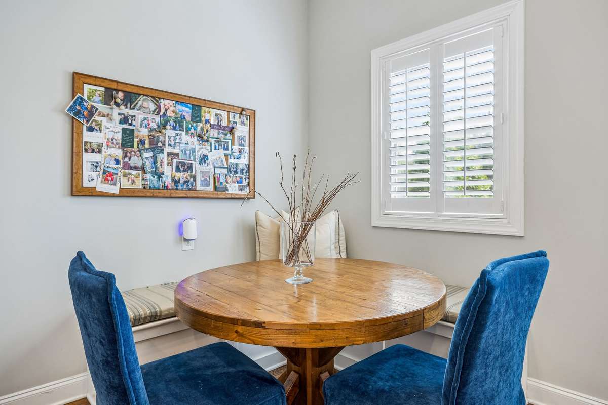 Eat in kitchen nook with built in benches that offer storage space underneath