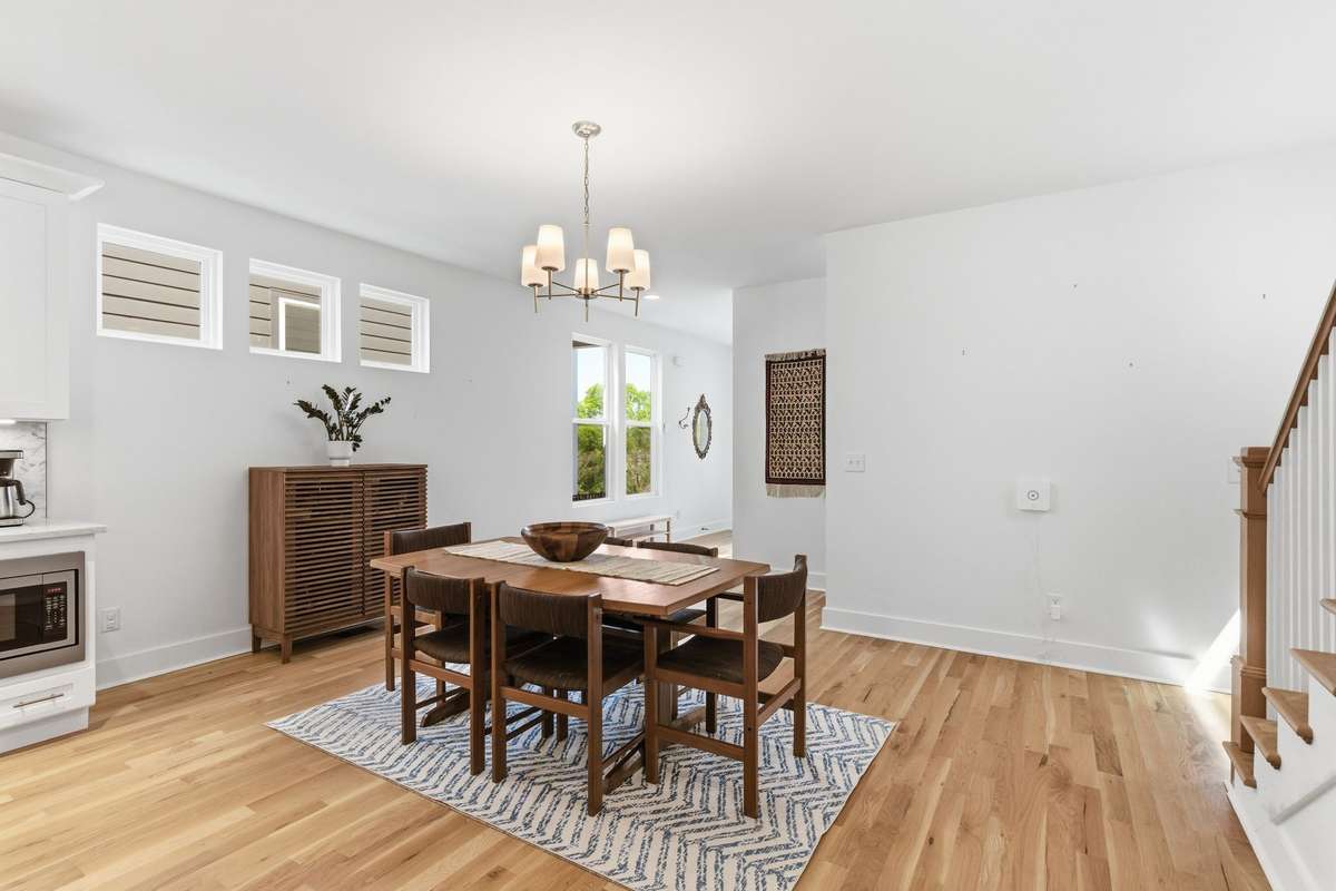 Dining area with elegant lighting.