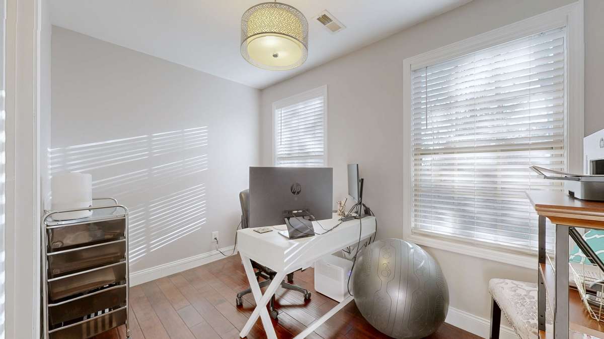 Private entrance in back of house can be used as Hobby Room, Bonus Room, She shed, Office Has a half bath.