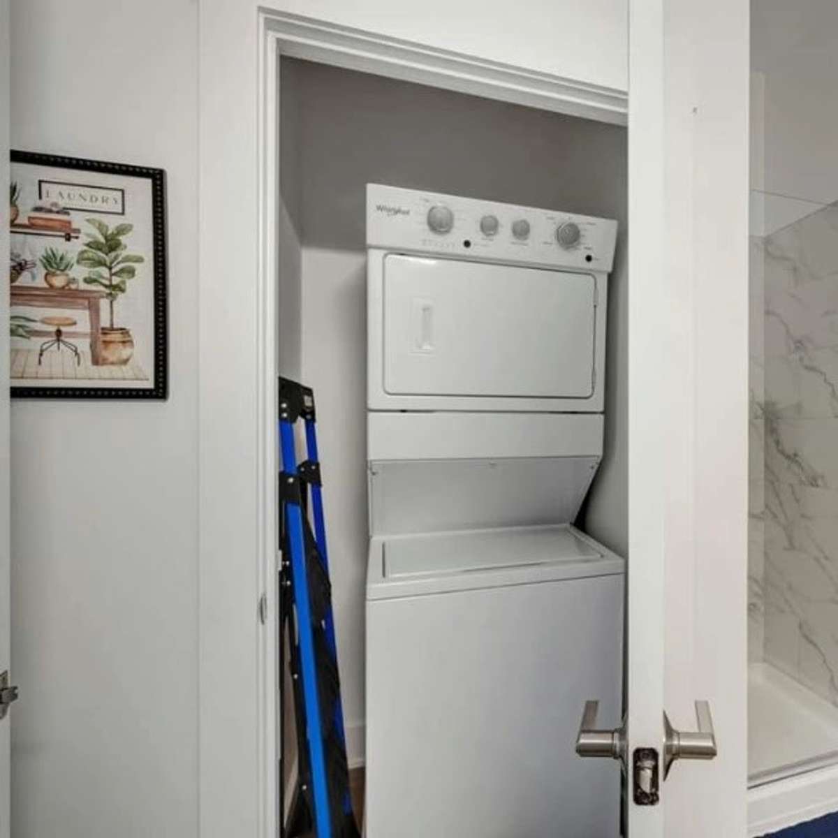 This stackable washer/dryer was replaced with a new LG unit in January 2025.