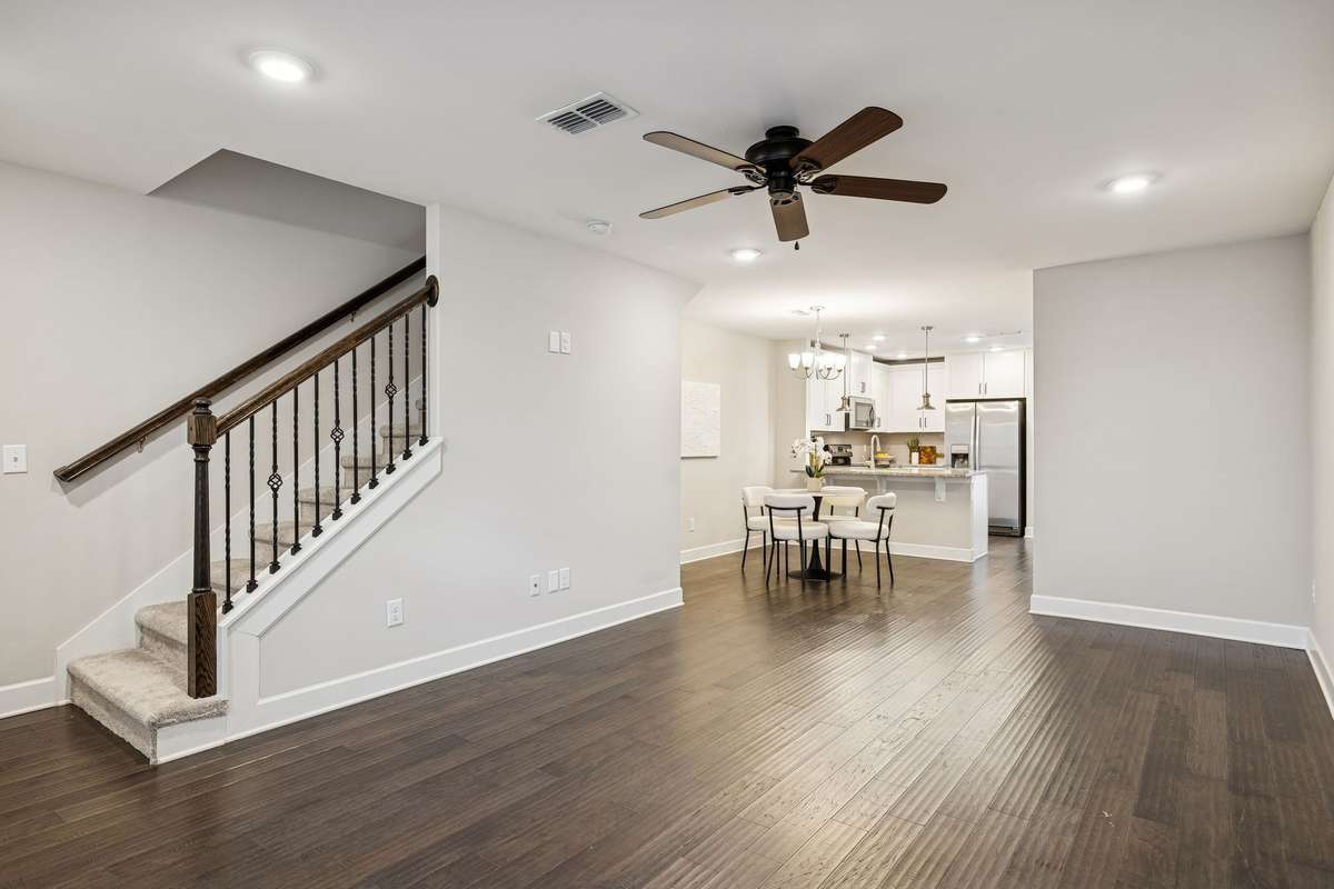 Open-concept layout that flows effortlessly from the living room into the dining area and kitchen—ideal for both everyday living and entertaining.