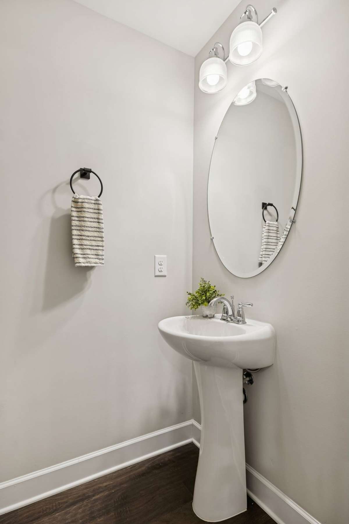 Convenient main-level half bath, perfectly placed for guests and everyday use.