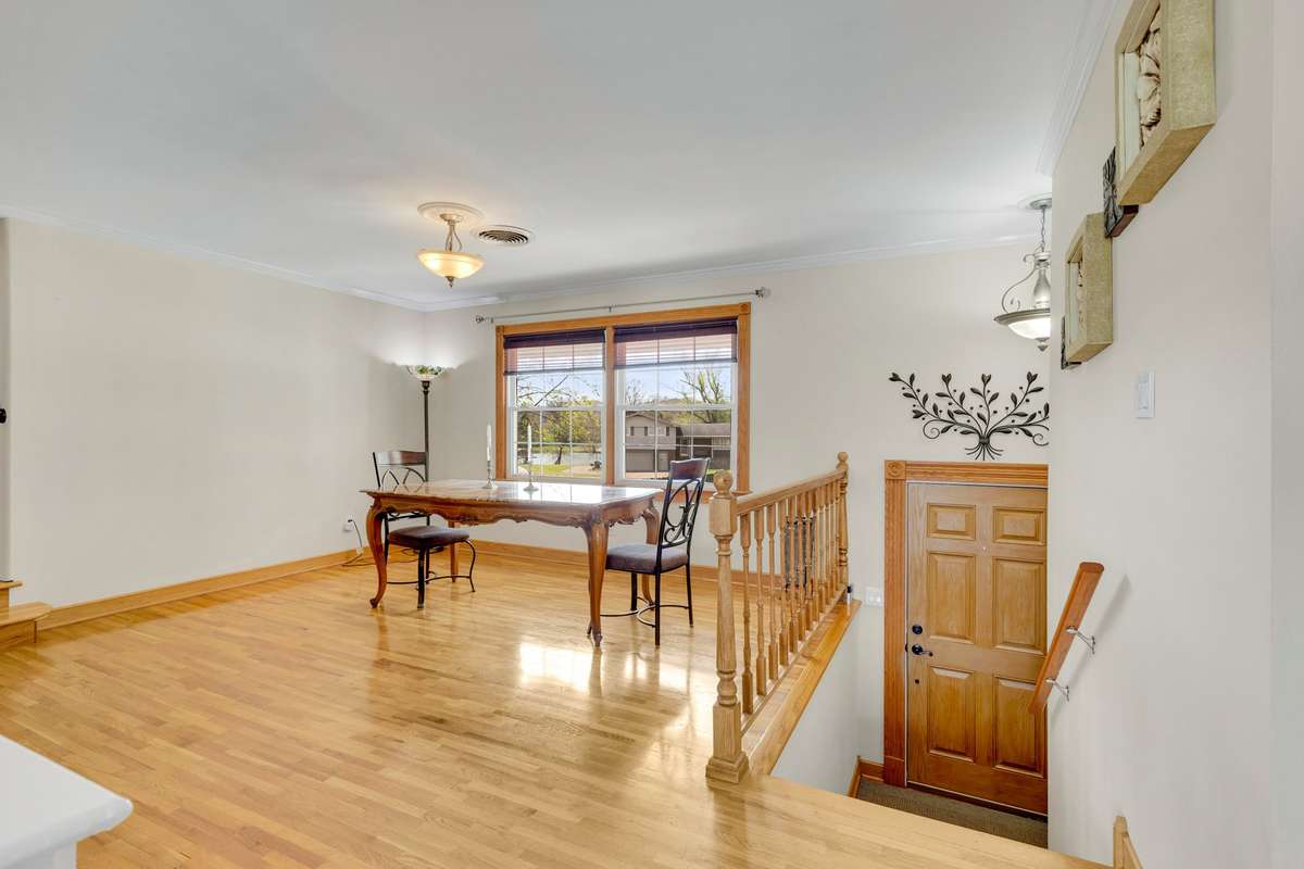 Dining area overlooking a cove. The wall between the kitchen and dining area could easily be opened up for an open concept