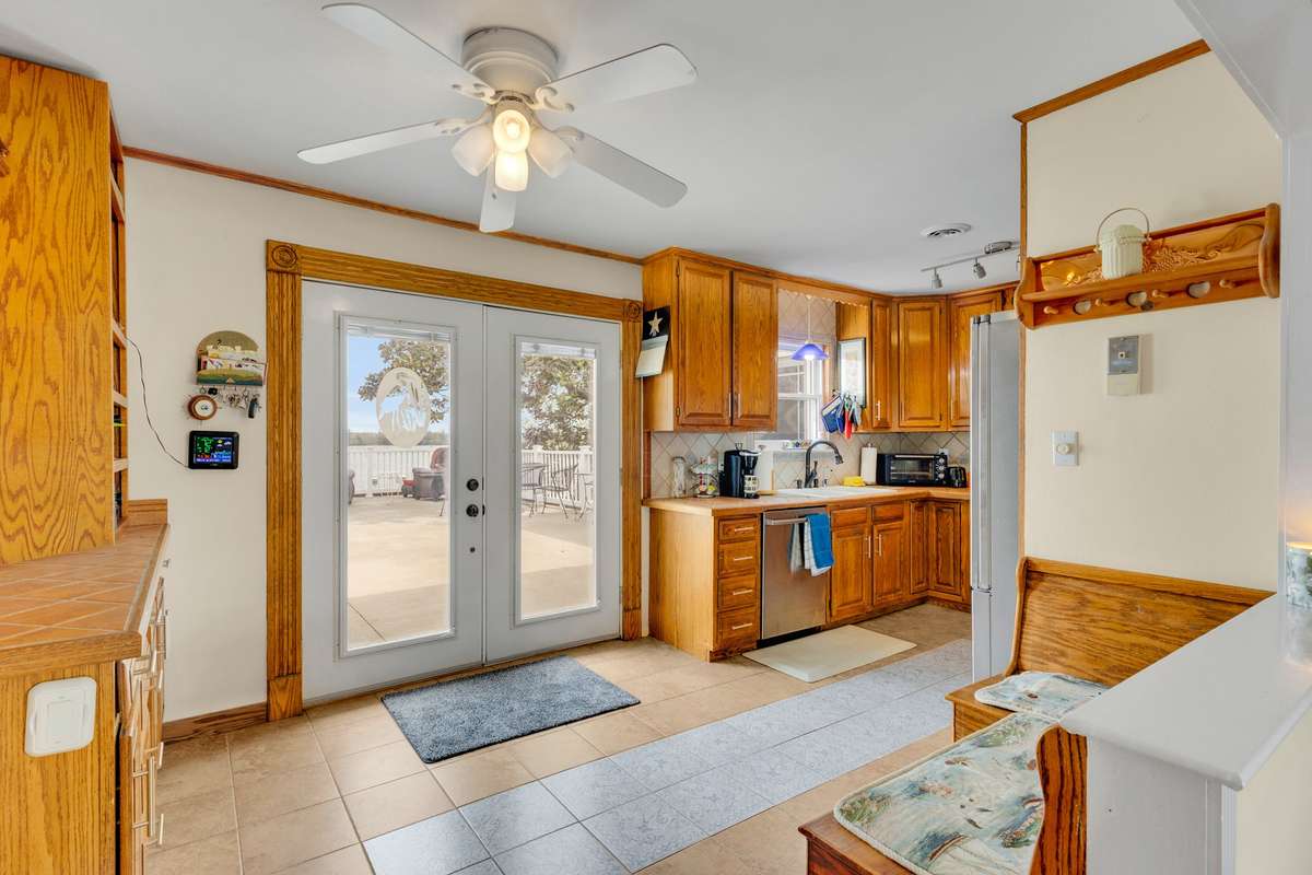 Kitchen with double doors to the expansive deck.