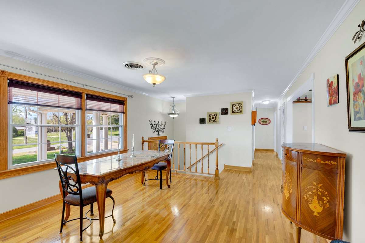 Dining area overlooking a cove. The wall between the kitchen and dining area could easily be opened up for an open concept