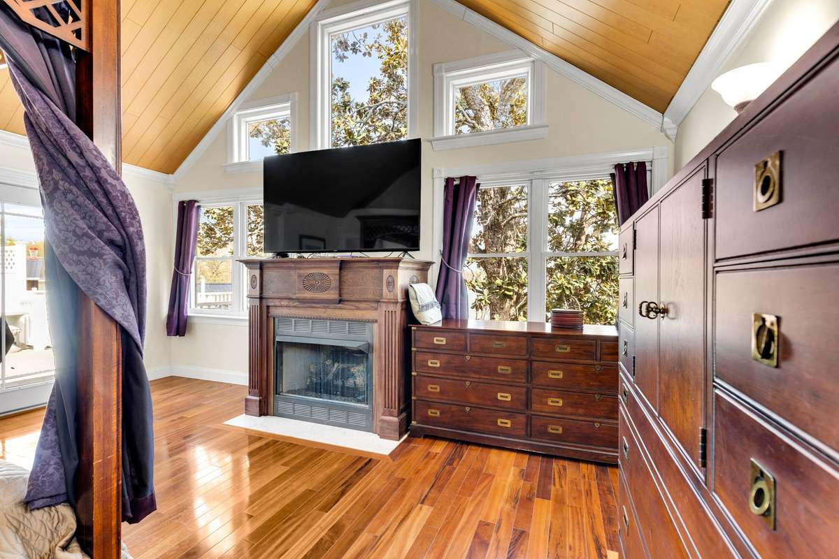 Owner's Suite with Brazilian tiger wood floors, spa-like bath, and a wonderful view of the lake