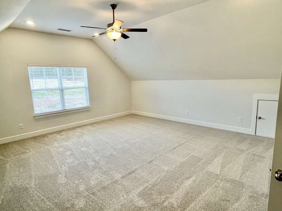 Large bonus room with a closet and a door for TV room, older child, guests....