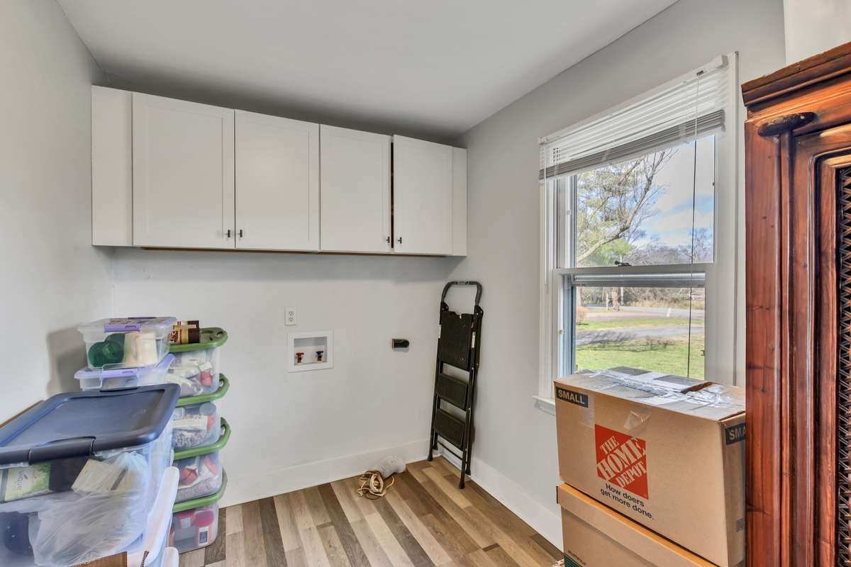 Roomy Utility Room  has light and storage