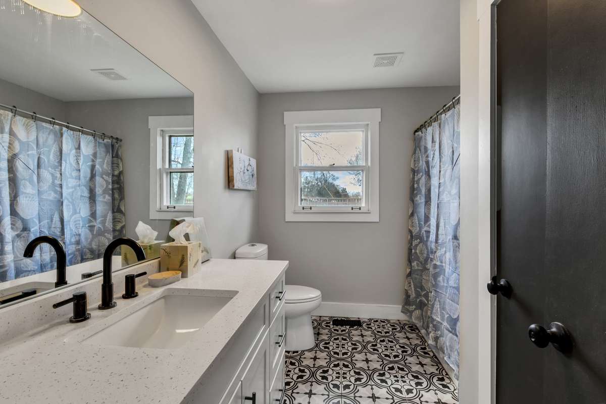 Master Bath, handsomely renovated and decorated