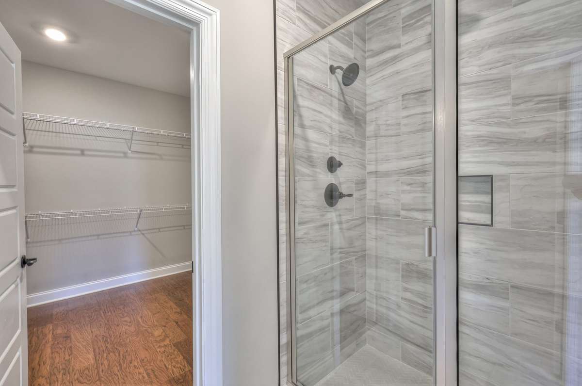 Primary Bath- Shower and Walk-in Closet