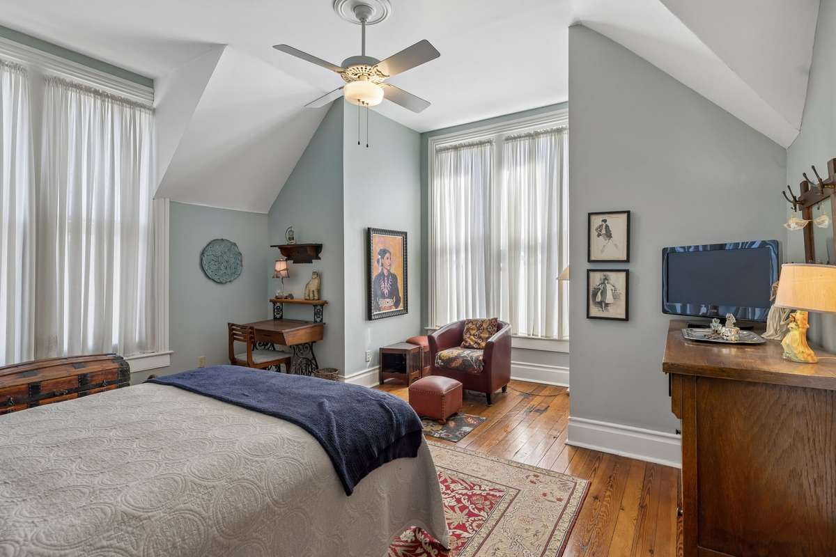 Western-facing bedroom on the second floor with a cozy reading nook