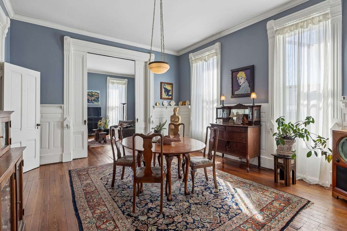 The very large dining room is positioned between the parlor and the kitchen.