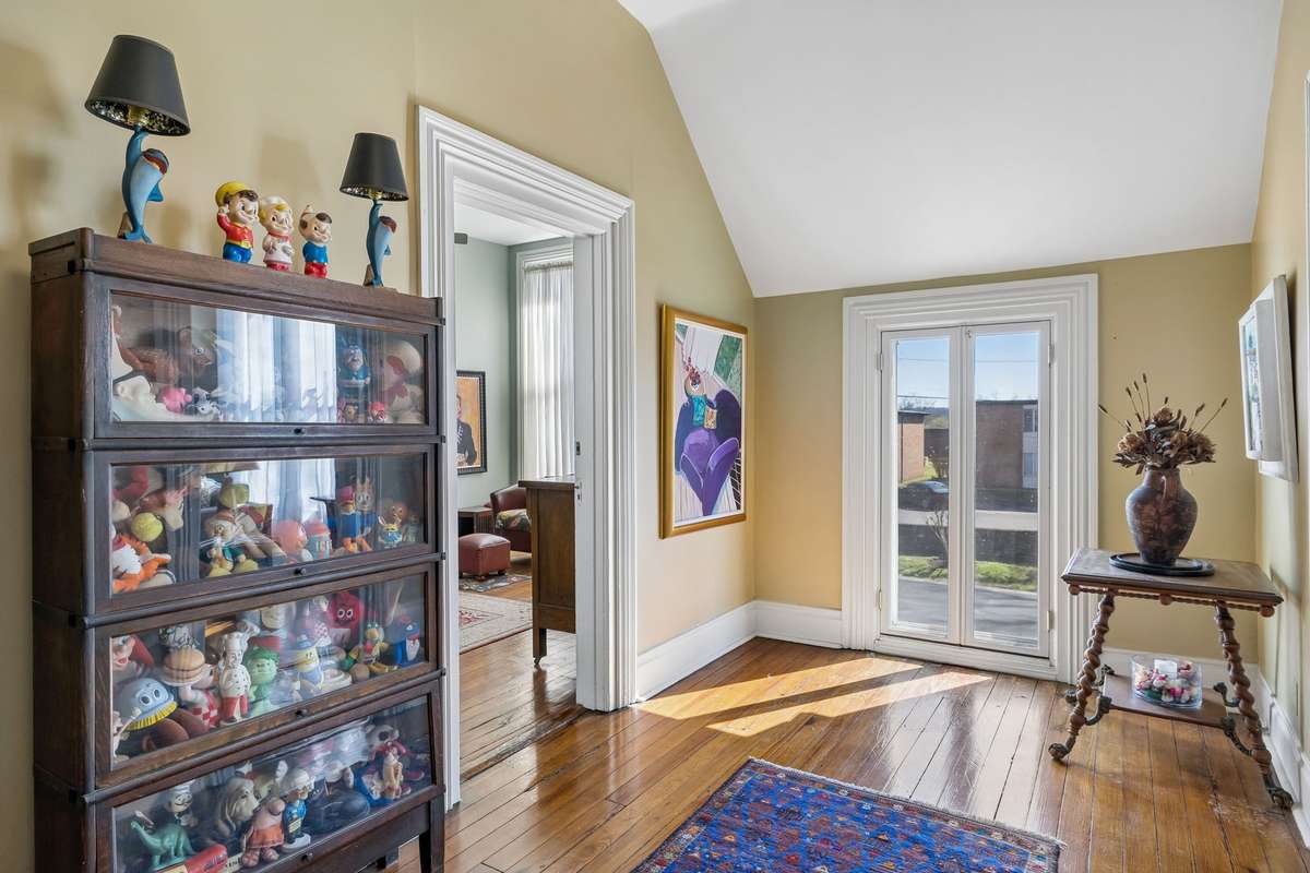 The extra-wide landing/hallway on the second floor.