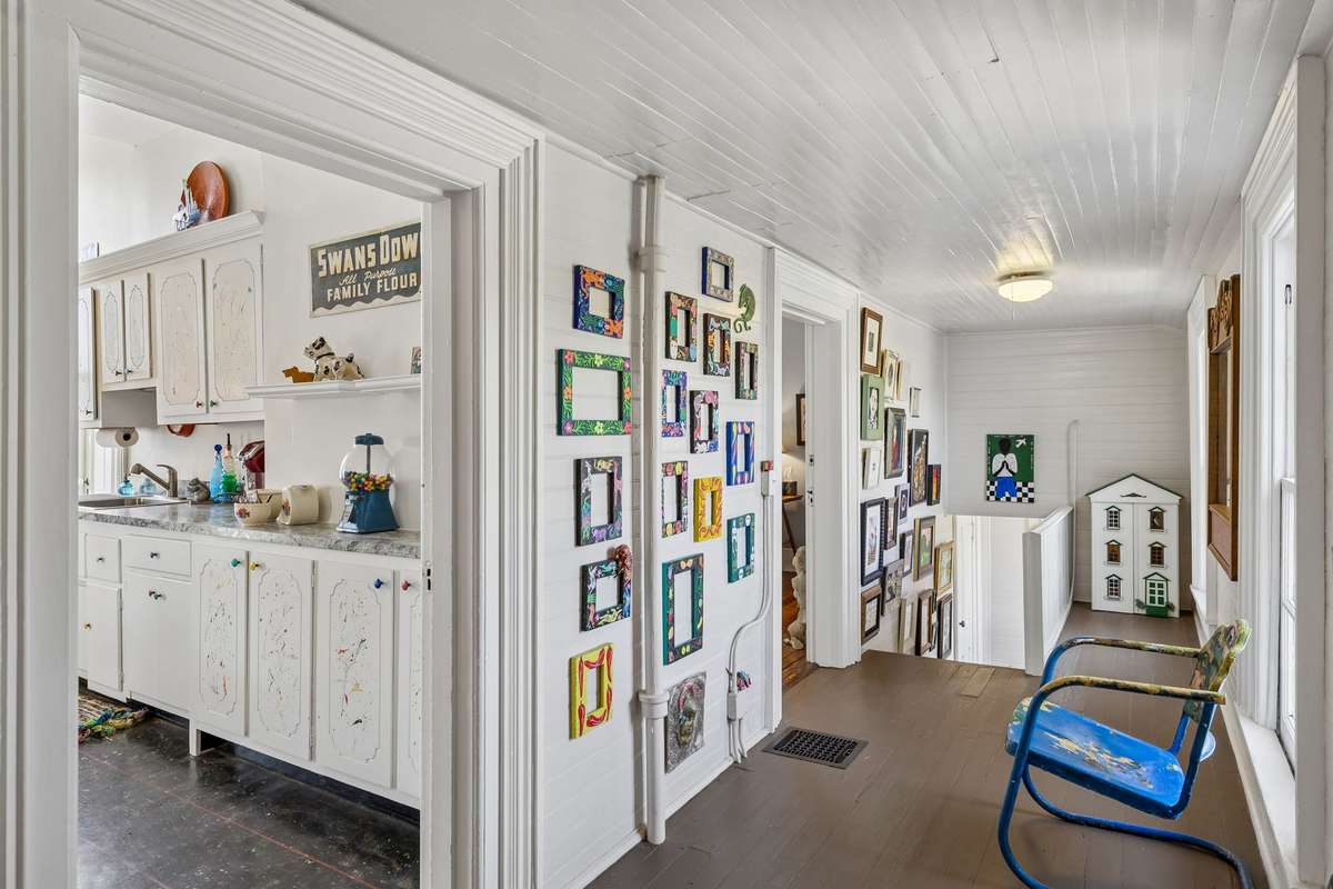 The Back staircase and hallway just off of the back bedroom and the large artist's studio