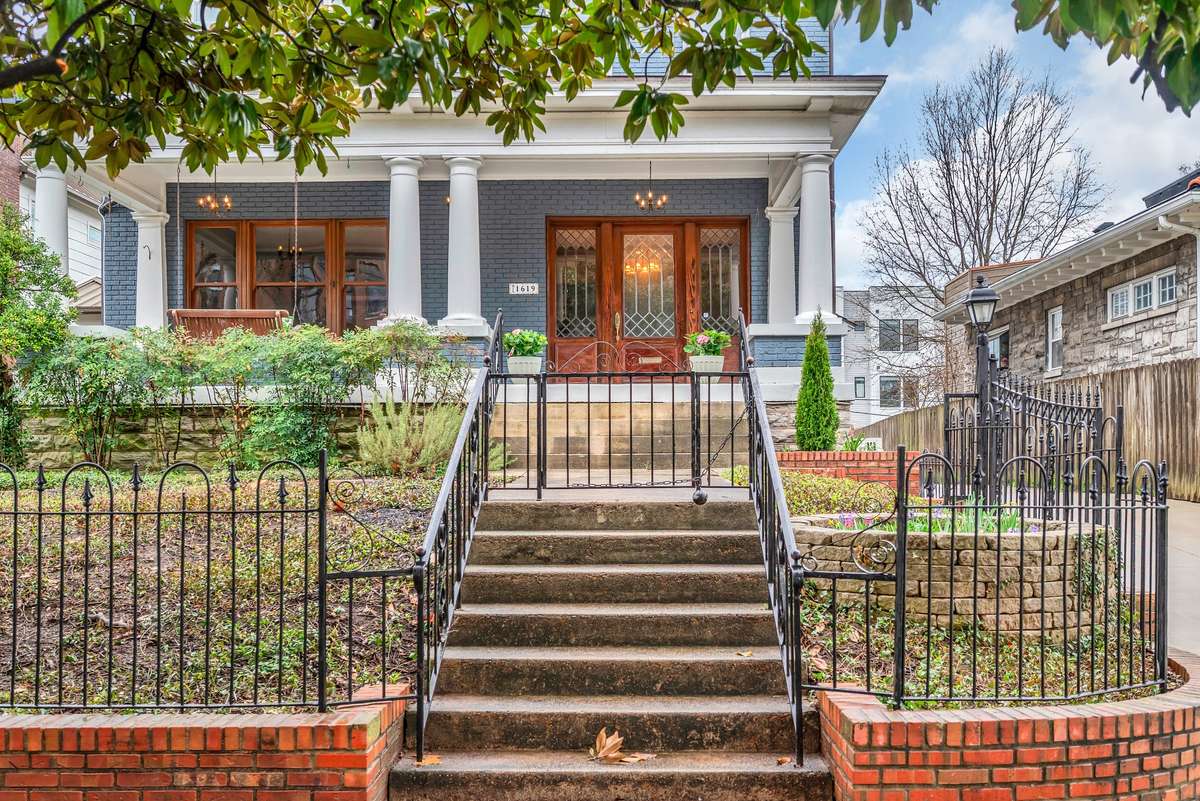 Wrought Iron Fencing adds to this home’s historic charm