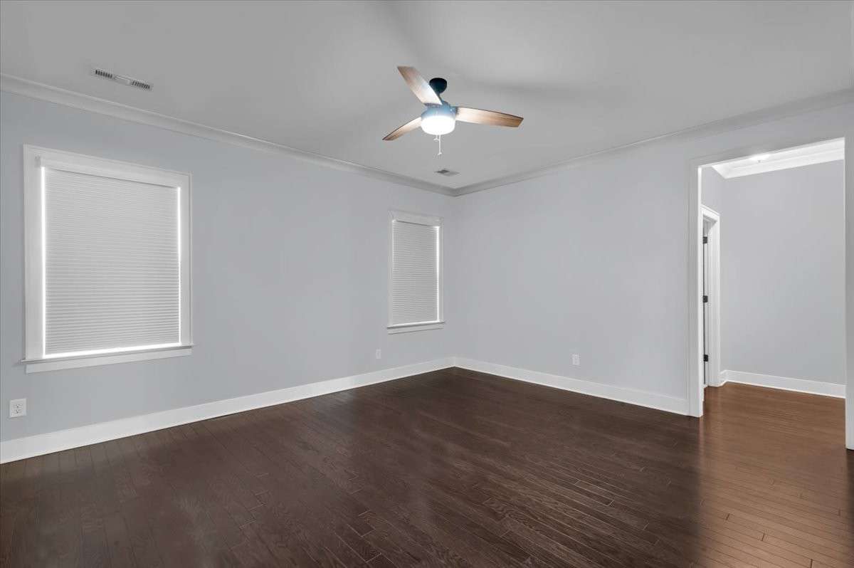 First floor primary bedroom blackout shades down