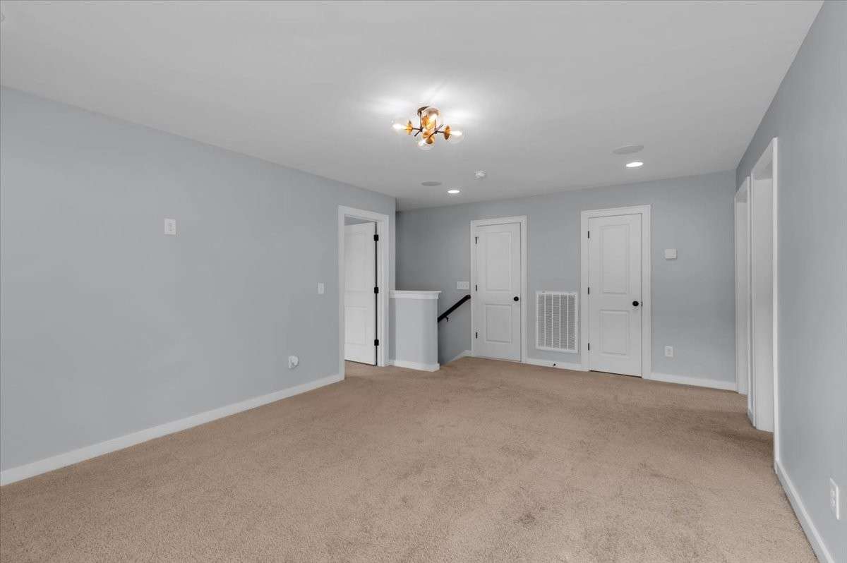 Upstairs bonus room is central to 3 secondary bedrooms