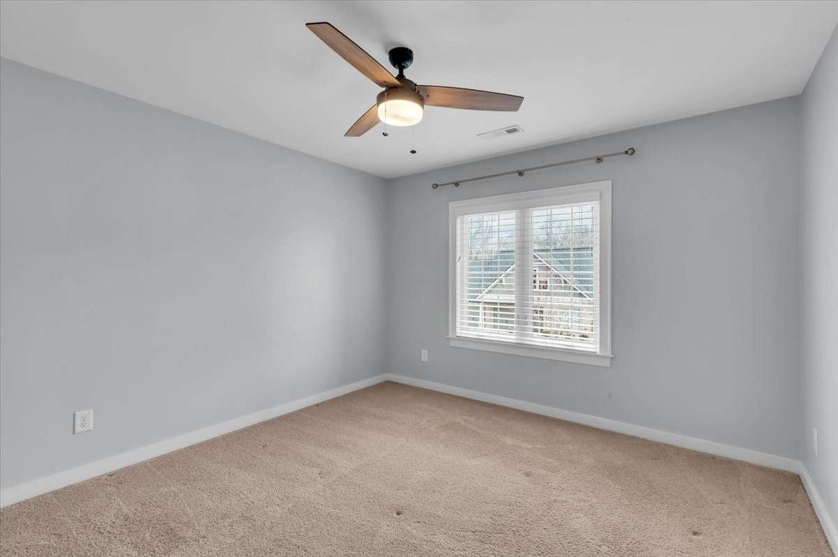 Bedroom 2 with custom walk-in closet