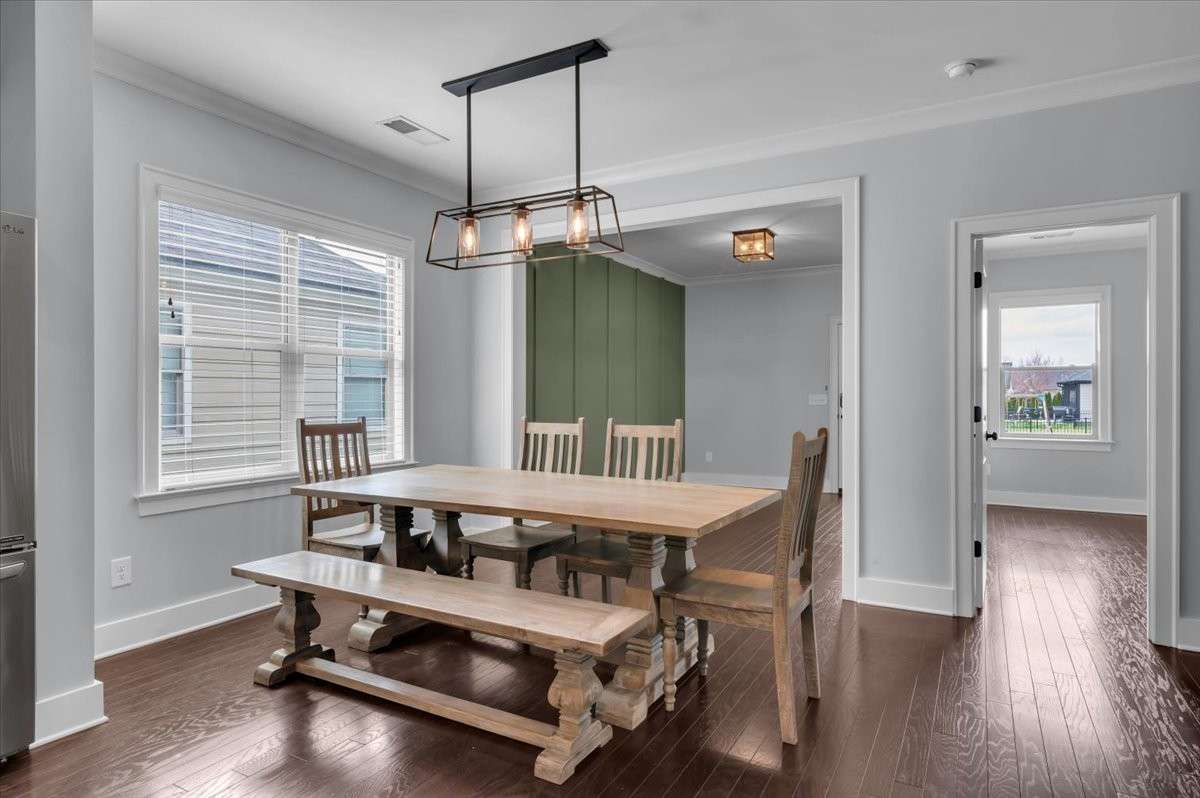 Dining table custom made for this space stairs.