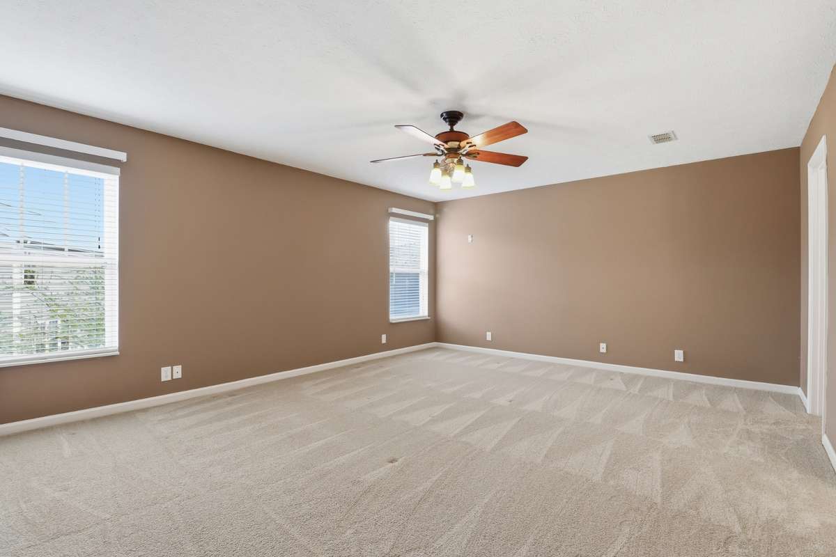The Primary bedroom is large with nice size walk in closet and full bath