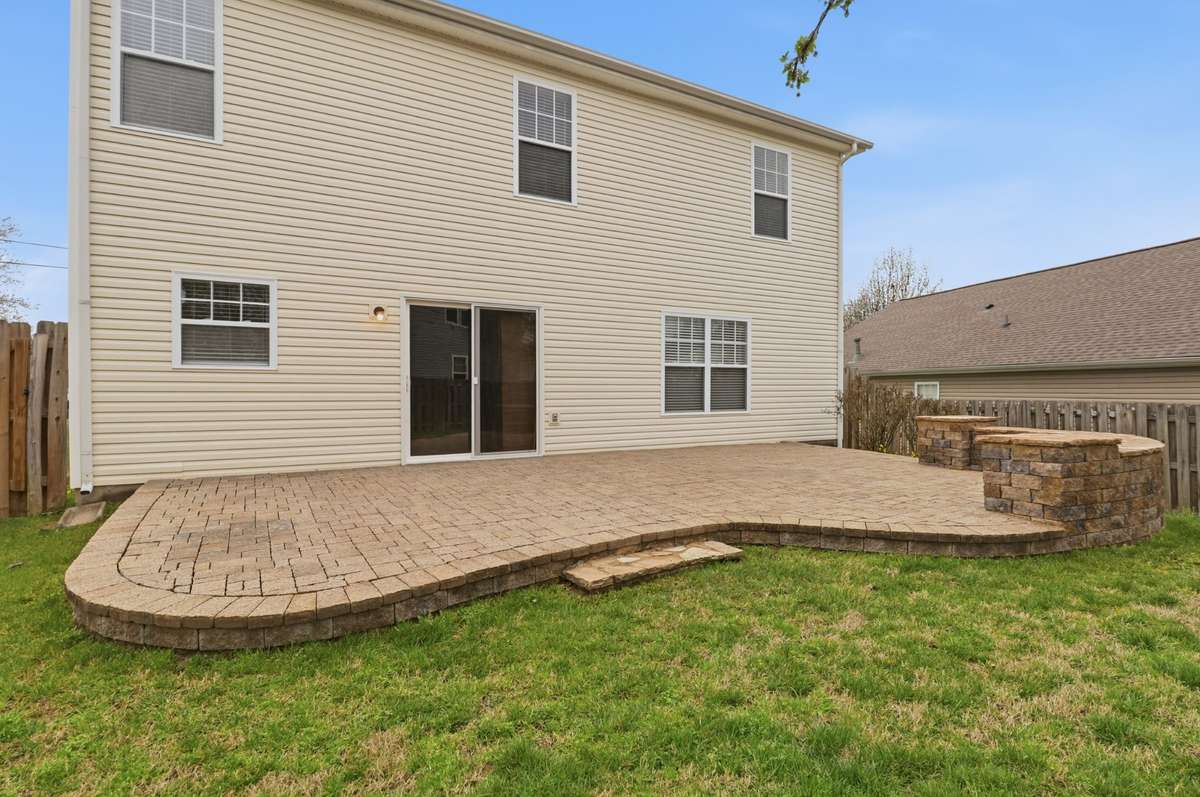 Look at the size of this patio and the back yard is fenced in with a privacy fence. Making this space great for entertaining, morning coffees or watching the pets/kids play